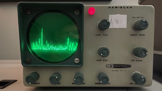 Operating Heathkit HO-13 Ham-Scan showing signals across its green CRT display